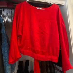 Red satin open back with tie top.